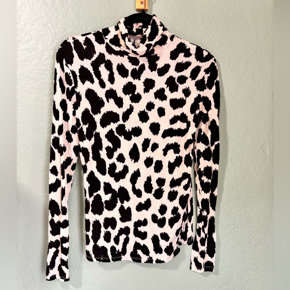Animal print turtleneck blouse